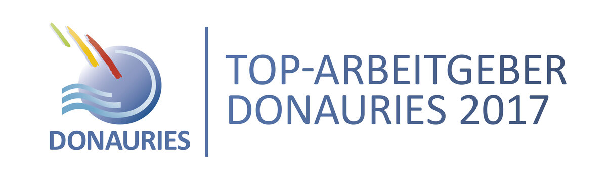 Logo mit blauem Kreis, drei Wellen und drei Streifen in Grün, Gelb und Rot; links darunter Schriftzug DONAURIES; rechts, durch Linie getrennt, Text: TOP-ARBEITGEBER DONAURIES 2017.